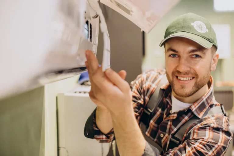 repairman-doing-air-conditioner-service-scaled